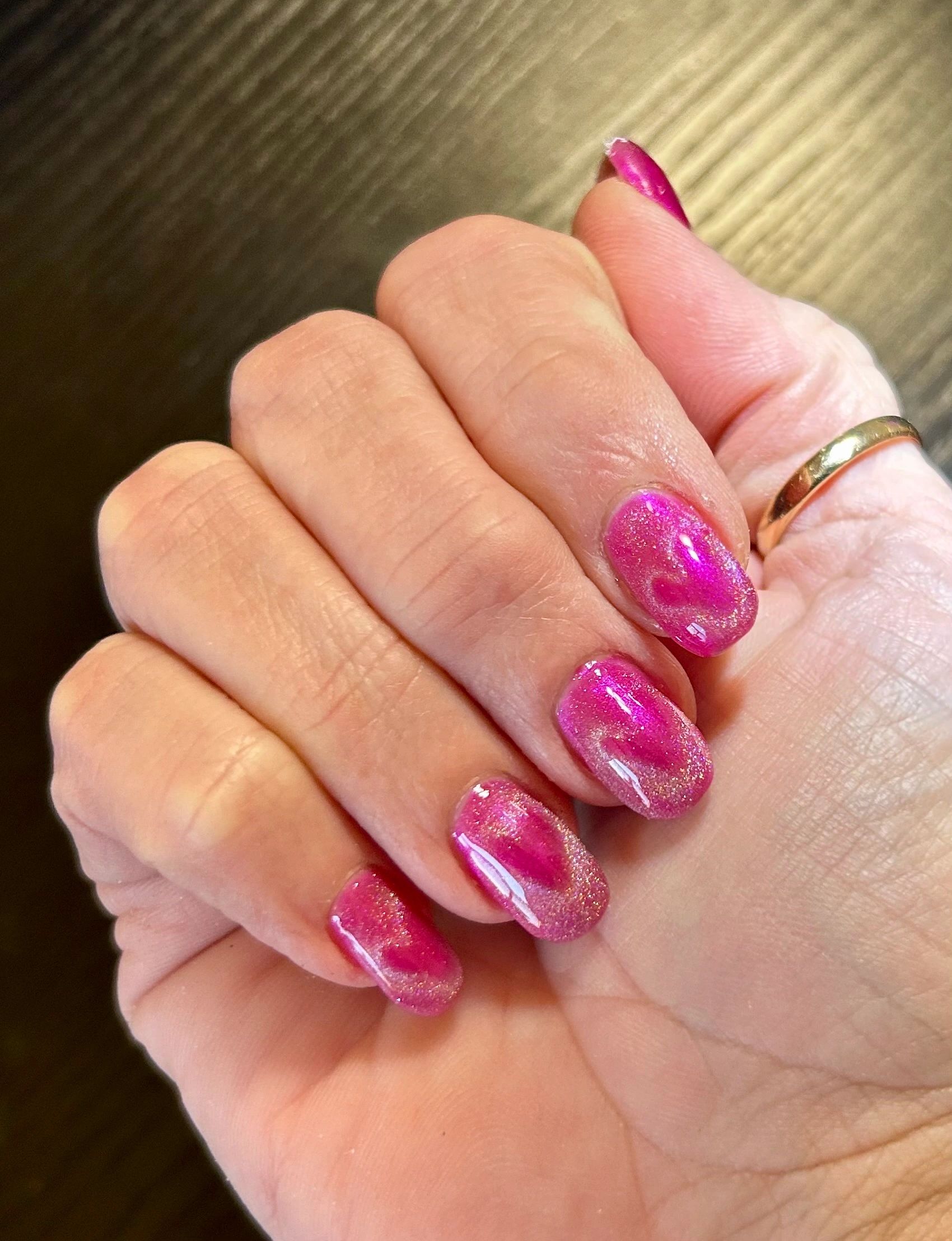Magenta glitter oval nails